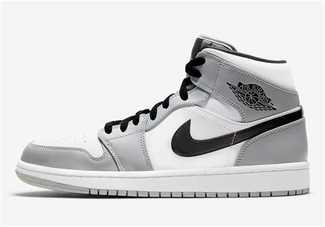 nike jordan 1 mid grigie e bianche